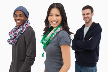 Happy stylish young people in a row