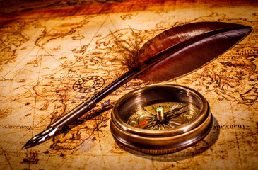 Vintage items on ancient map.