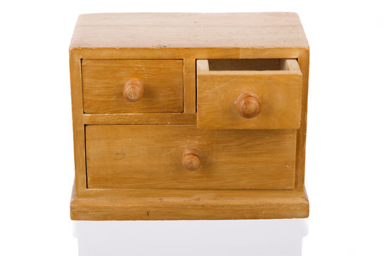 Wooden jewelry box with open drawer