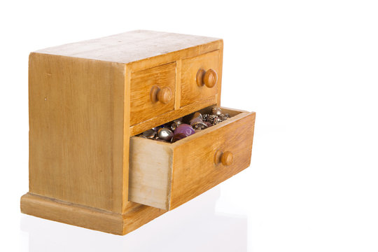 Wooden jewelry box with open drawer