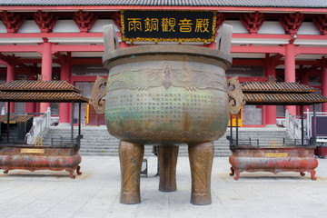 Bronze cauldron in a Buddhist temple. Dali. China.