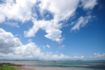 steam boat sailing on the sea near coastline