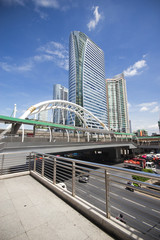 Pubic skywalk with modern buildings of Bangkok