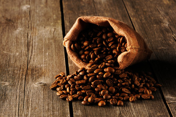 Coffee beans in bag on table