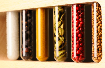 Naklejka premium Spices in beakers