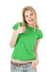 Happy young girl shows thumb up on white background.