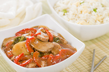 Chinese style pork with red peppers served with egg fried rice.