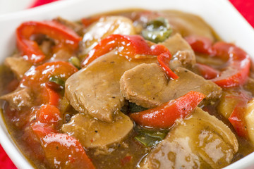 Chinese style pork with red peppers served with egg fried rice.