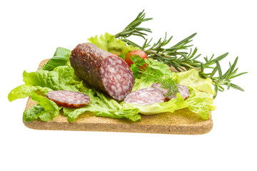 Salami with rosemary, salad and tomatoes
