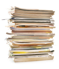 Stack of old magazines isolated on white. Paper recycling