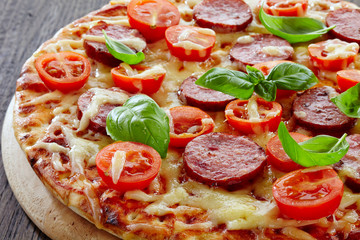 Salami and tomato pizza