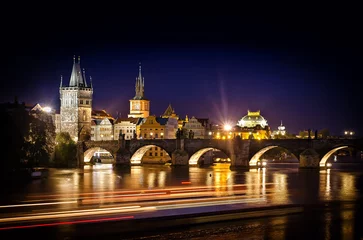 Foto op Canvas Night shot of Charles Bridge and river in Prague © theartofphoto