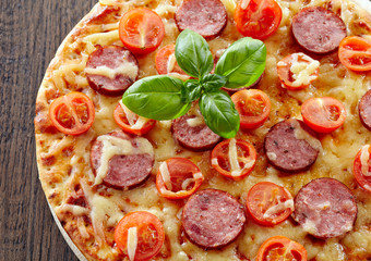 Salami and tomato pizza