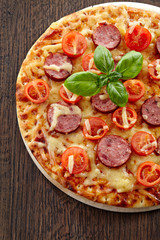 Salami and tomato pizza