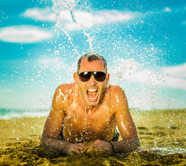 sexy young man at the beach