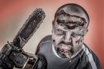 zombie with mechanical saw