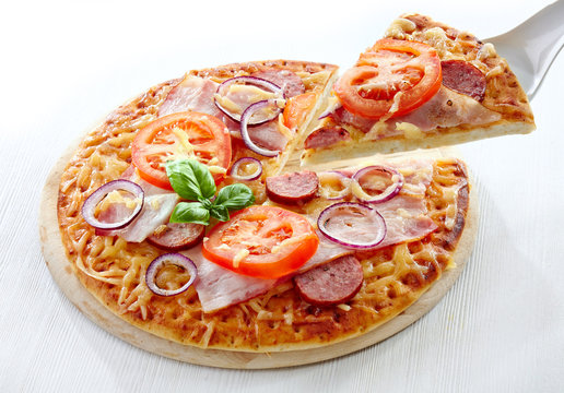 Salami and tomato pizza