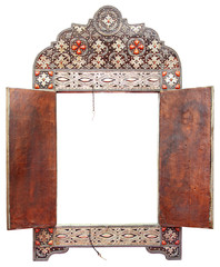 Antique Moroccan mirror frame made of silver and leather, isolated on white background 