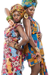Fototapeta na wymiar Two African fashion models on white background.