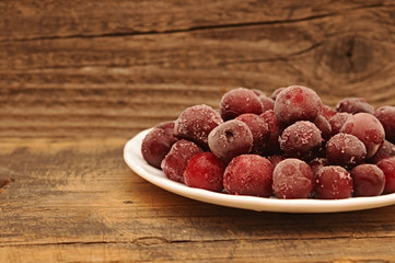 Ripe frozen sweet cherry close up.
