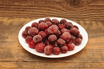 Ripe frozen sweet cherry close up.