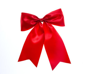 Red bow isolated on white.