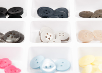 buttons of different size, shape and color isolated on white