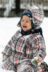 Boy playing in snow