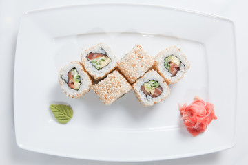Maki Sushi on plate isolated on white