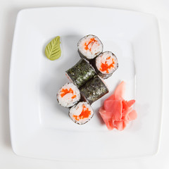 Maki Sushi on plate isolated on white