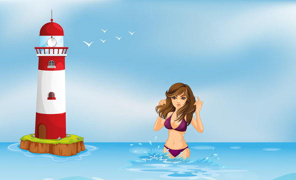 A girl wearing a bikini at the beach beside a tower