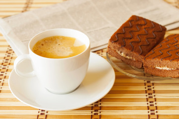 cup of coffee with sponge cake