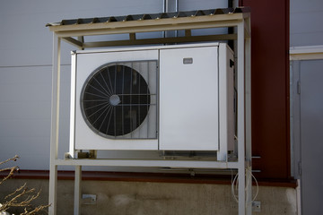 conditioners on a house wall