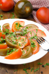 salad of two varieties of tomatoes with fresh parsley