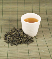 White cup of black tea
