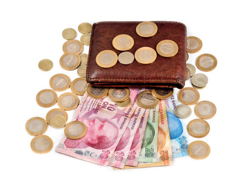 Turkish money and wallet on white background