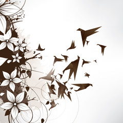 Origami paper bird on abstract background