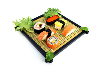 Sushi arrange them on a bamboo dish.