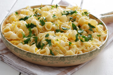 Pasta with cheese, lemon peel and pastry