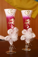 decorated wedding glasses with champagne
