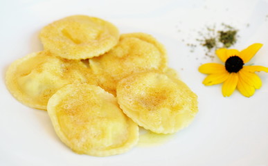 Ravioli, italian egg pasta filled with ricotta and spinach