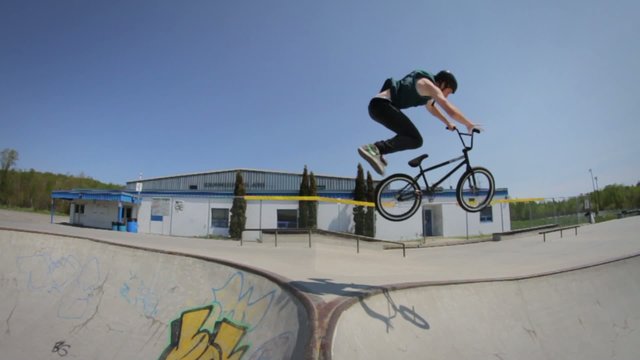BMX Bike Rider Does Big Trick