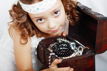 beautiful little girl plays