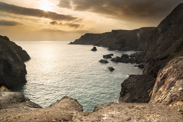 Spring sunset at high tide at Kynance Cove