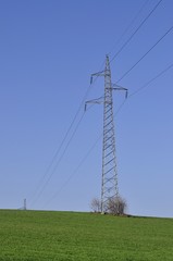 Electric transmission tower in the field
