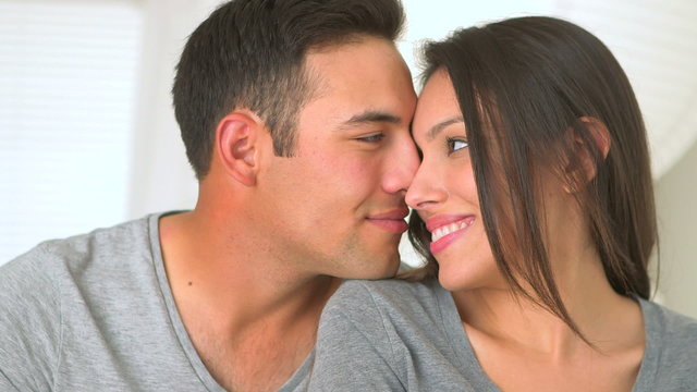 Cute Mexican couple kissing