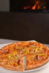 Foto op Plexiglas Hot pizza with oven fire on background © Visionsi