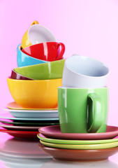 Mountain colorful dishes on pink background