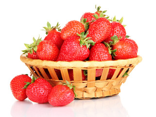 Fresh strawberry in wicker basket isolated on white