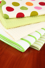 Kitchen towels on wooden background